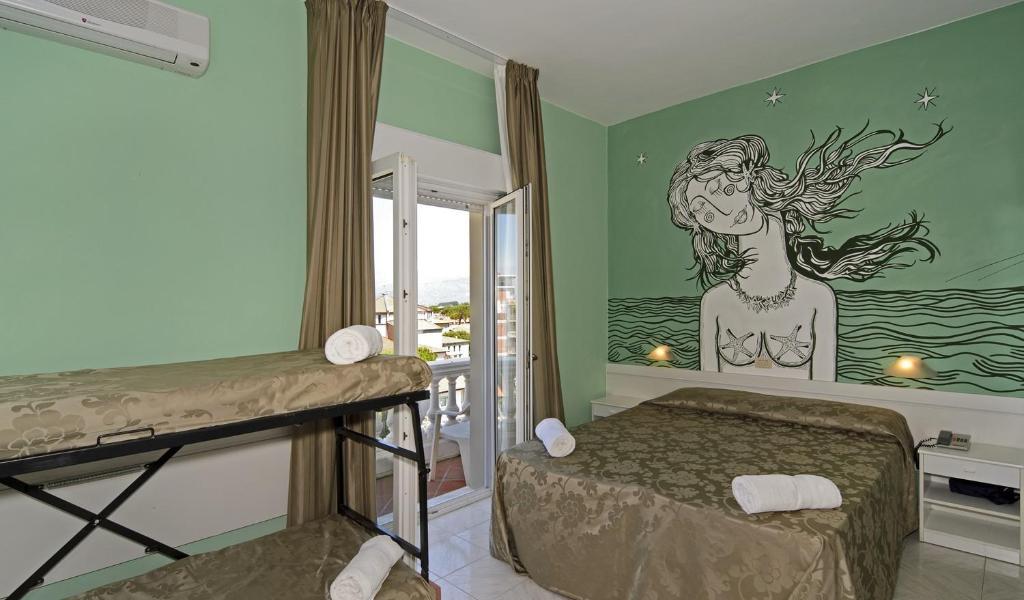 Hotel Regina Lido di Camaiore Pokoj fotografie